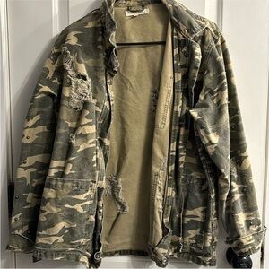 Distressed camo denim jacket